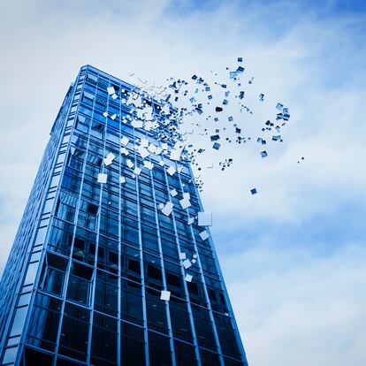 Pixelated highrise building and cloudy sky