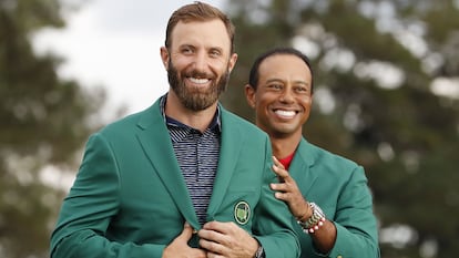 Dustin Johnson y Tiger Woods, en el Masters de 2020.