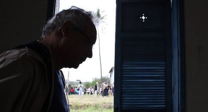 Umberto Trigueiros Lima in the house where he was tortured in Rio de Janeiro.