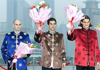 Andre Agassi, Albert Costa y Roger Federer, en la ceremonia de presentación del Masters.