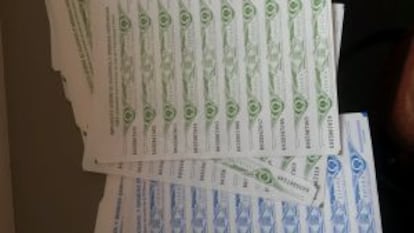 Fake tax seals seized by the police during the raid on manufacturers of irregular liqueurs.