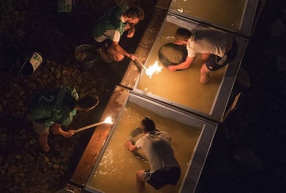 Panning for gold in the dark during a competition.