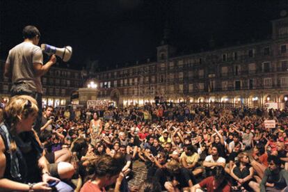 Protestors in Madrid's Plaza Mayor on Tuesday night, after police stopped them from accessing Sol square.