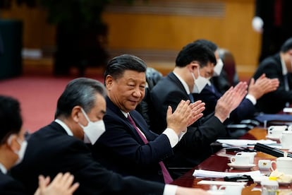 The Chinese president, Xi Jinping, applauds during a meeting with his Gabonese counterpart, Ali Bongo Ondimba, in Beijing on Wednesday. 