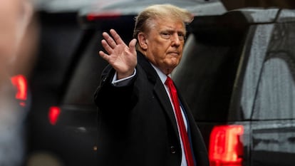 Donald Trump greets his supporters outside Trump Tower on Fifth Avenue in New York on January 26.