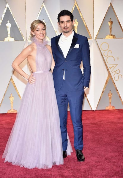 Olivia Hamilton y el director Damien Chazelle, nominado por La La Land.