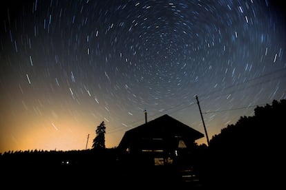A long-exposure photograph taken during a night of shooting stars in Saint- Cergue, Switzerland.