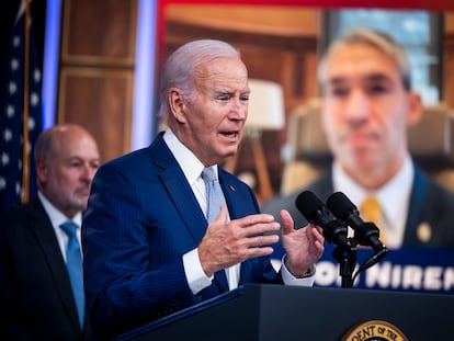 US President Joe Biden (C) announces new measures to help protect workers and communities from extreme heat in the Eisenhower Executive Office Building in Washington, DC, USA, 27 July 2023.