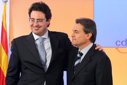 David Madí junto al expresident Artur Mas en el acto en 2010 en el que anunció que se retiraba de la política.