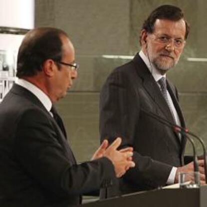 Hollande y Rajoy apoyan que el BCE intervenga en el mercado de deuda