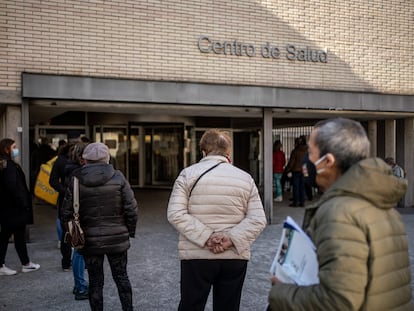 Patients wait outside Los Yébenes medical center in Madrid.