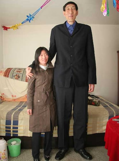Bao Xishun, junto a su esposa, Xia Shujian