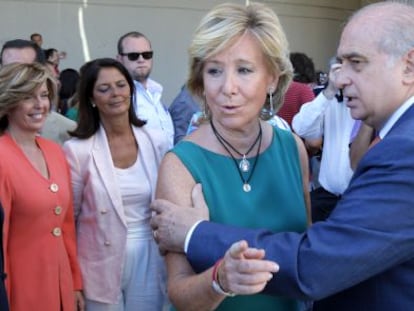 El ministro del Interior y la presidenta de la Comunidad de Madrid, en un acto el jueves.