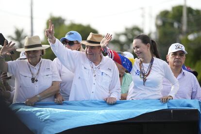 Presidential candidate Edmundo González and opposition leader Maria Corina Machado greet supporters during a campaign rally, in Maracaibo, Venezuela, on July 23, 2024.