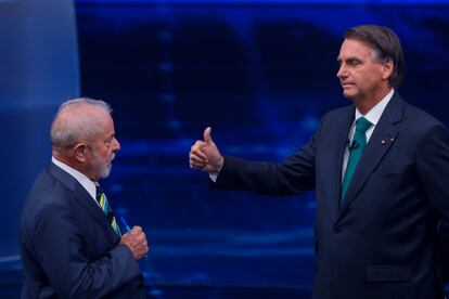 Lula da Silva y Jair Bolsonaro, en un momento del debate de este domingo.