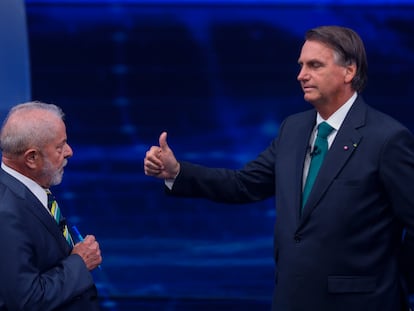 Lula da Silva y Jair Bolsonaro, en un momento del debate de este domingo.