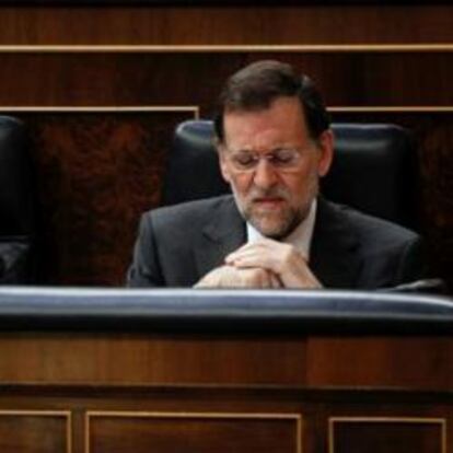 Mariano Rajoy y Soraya Sáenz de Santamaría ayer en el Congreso