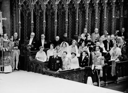 Eyes of the World's representatives follow Queen Elizabeth II's progress through Westminster Abbey as she arrives for her coronation.   