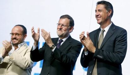 El presidente del Gobierno, Mariano Rajoy, junto al candidato del PPC a la Generalitat, Xavier García Albiol, este viernes.