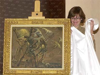 Montse Aguer, directora del Centro de Estudios Dalinianos, descubre el cuadro <i>Tres mujeres...,</i> de Dalí.