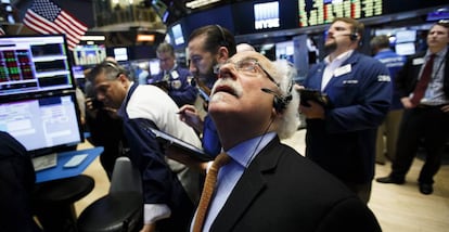 Corredores de bolsa en Wall Street.