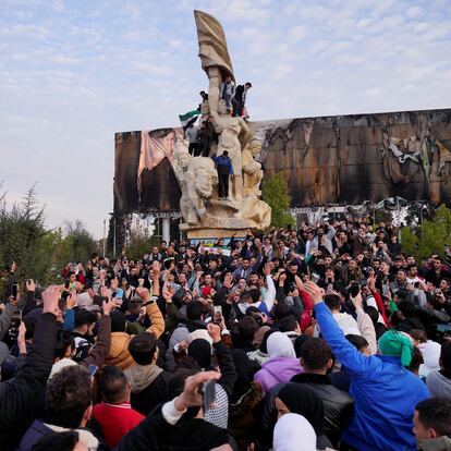 People gather at Saadallah al-Jabiri Square as they celebrate, after Syria's army command notified officers on Sunday that President Bashar al-Assad's 24-year authoritarian rule has ended, a Syrian officer who was informed of the move told Reuters, following a rapid rebel offensive that took the world by surprise, in Aleppo, Syria December 8, 2024. REUTERS/Karam al-Masri