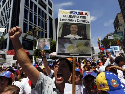 Demonstrators call for the release of political prisoners in Caracas on Saturday.