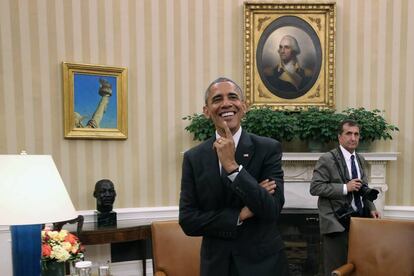 Barack Obama y Pete Souza en la Oficina Oval de la Casa Blanca, en 2015.