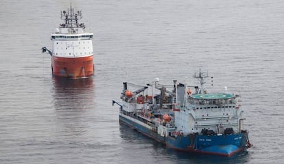 Ships lay out the Western Link submarine cable.