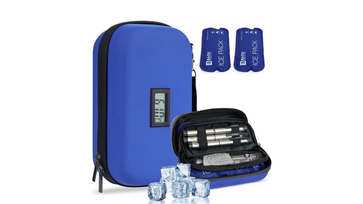 Refrigerador de medicina para viajes con termómetro.