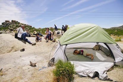 Migrants rest after crossing the border in Jacumba Hot Springs, California, on June 9.