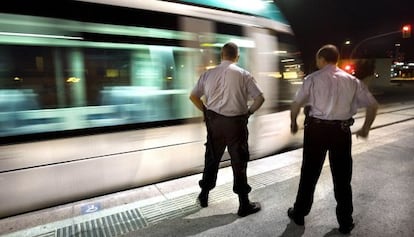 Private security guards at work in Barcelona. Employees in the sector may soon be policing public events.