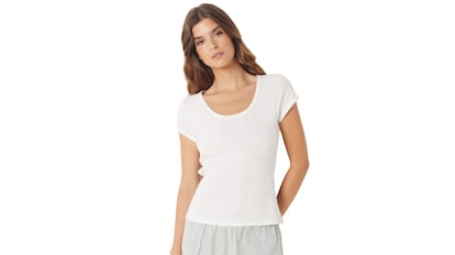 Camiseta de algodóny manga corta de Lohane. Escote redondo y lazo decorativo. Tendencia pointelle.