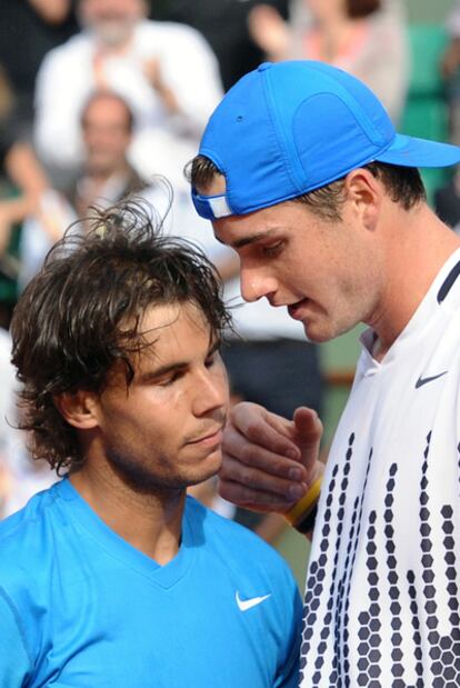 Isner y Nadal, tras el partido.