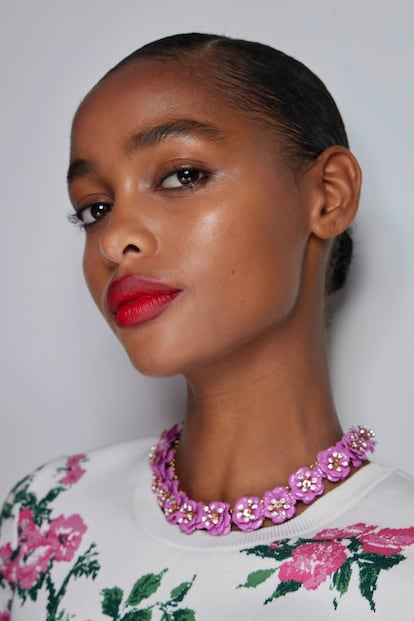 Flawless makeup with red lips at the Carolina Herrera spring/summer 2024 show.