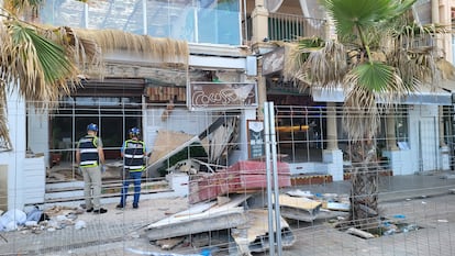 24 May 2024, Spain, Palma de Mallorca: Two police officers stand in front of the collapsed building. Two German women and two other people have died in the collapse of a fully occupied restaurant in Playa de Palma on Mallorca. Photo: Roland Sprich/dpa (Photo by Roland Sprich/picture alliance via Getty Images)