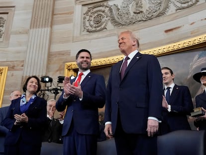 U.S. President-elect Donald Trump, and JD Vance, walk on stage before taking their oaths of office during the Inauguration ceremonies in the Rotunda of the U.S. Capitol in Washington, U.S., Jan. 20, 2025. Morry Gash/Pool via REUTERS