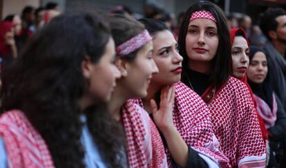 Cuatro jóvenes simpatizantes del Frente Popular de Liberación Palestina participan en una protesta en Gaza el pasado 7 de diciembre. 