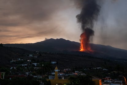 Lava from the volcanic eruption flows on the island of La Palma.