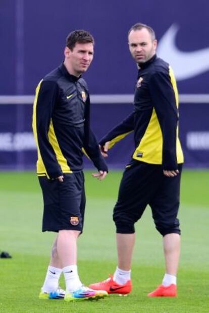 Messi e Iniesta, en el entrenamiento de ayer.