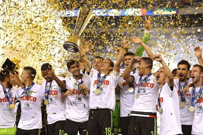 Mexico's national team members celebrate their Sunday night victory in Philadelphia.