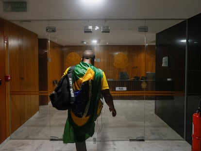 One of the protesters, a supporter of Jair Bolsonaro, inside the Congress building