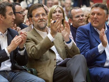 Martín (primero por la derecha) con Rajoy y Feijóo en 2011