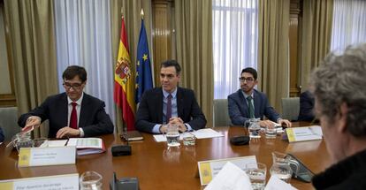 El presidente del Gobierno, Pedro Sánchez, y el ministro de Sanidad, Salvador Illa.