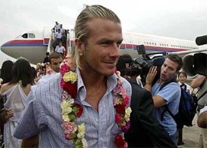 David Beckham, recibido como un ídolo, en la gira del Real Madrid por tierras asiáticas.