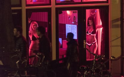 Sex workers in Amsterdam's red light district.