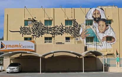 A picture taken on February 6, 2017 shows graffiti by Emirati artist Ashwaq Abdullah on the wall of a building on Dubai's 2nd of December street, which is part of the government-funded Dubai Street Museum project on February 6, 2017.
The streets of Dubai may be known for architectural superlatives like Burj Khalifa, the highest of the world's high-rises, and the Middle East's largest shopping centre Dubai Mall. But a group of street artists now also wants to turn the concrete walls of a fast-growing urban sprawl into an open-air museum that celebrates Emirati heritage and speaks to everyone in the multicultural city.

 / AFP PHOTO / NEZAR BALOUT / RESTRICTED TO EDITORIAL USE - MANDATORY MENTION OF THE ARTIST UPON PUBLICATION - TO ILLUSTRATE THE EVENT AS SPECIFIED IN THE CAPTION