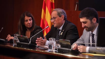 Quim Torra, entre Meritxell Budó y Jordi Puigneró.