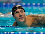 Caeleb Dressel after the men’s 50-meter freestyle during wave 2 of the U.S. Olympic Swim Trials on Sunday, June 20, 2021, in Omaha, Neb. (AP Photo/Jeff Roberson)