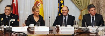 Cristina Cifuentes y Antonio de Guindos, durante la reunión.